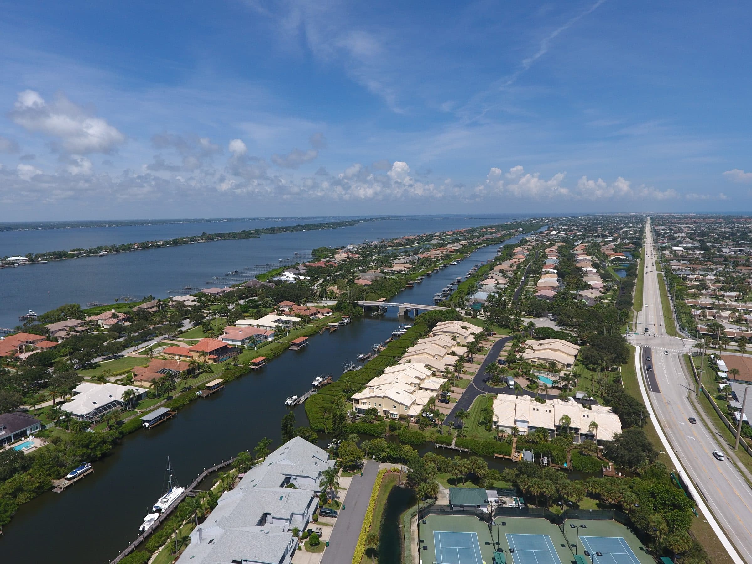 Aerial view of lake and waterfront homes