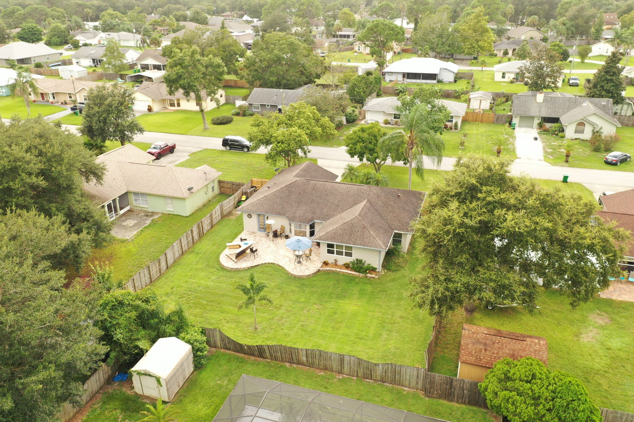 Drone view of Port St. John single-family neighborhood