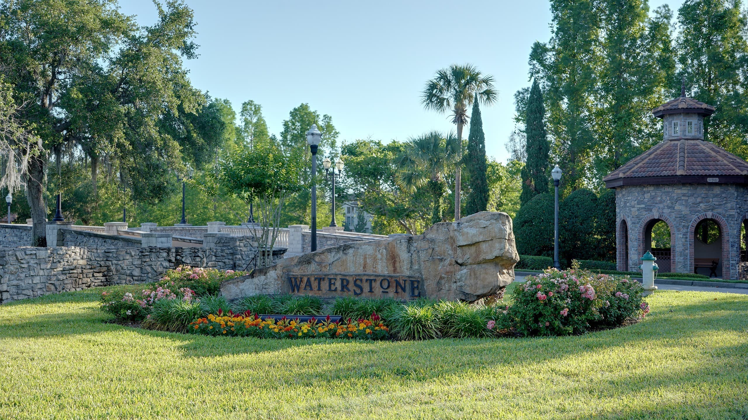 Waterstone gated entrance with brick pavers