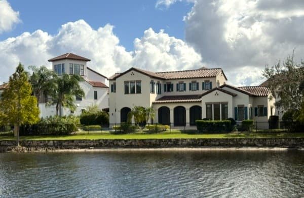 Spanish Colonial estate on the water inside Golden Oak