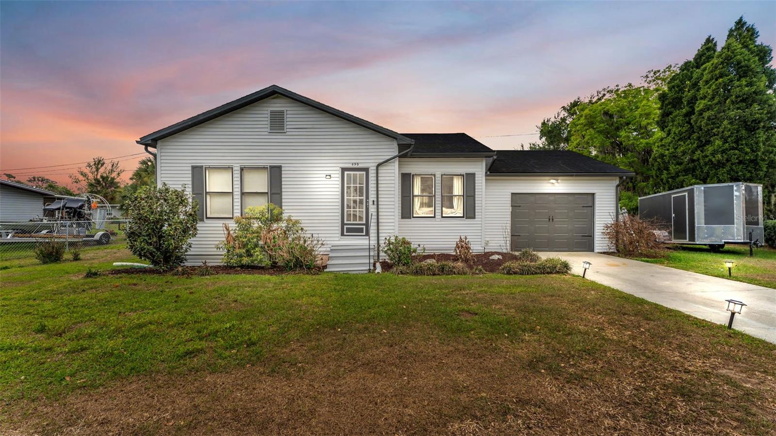 495 W Plumosa St, FL