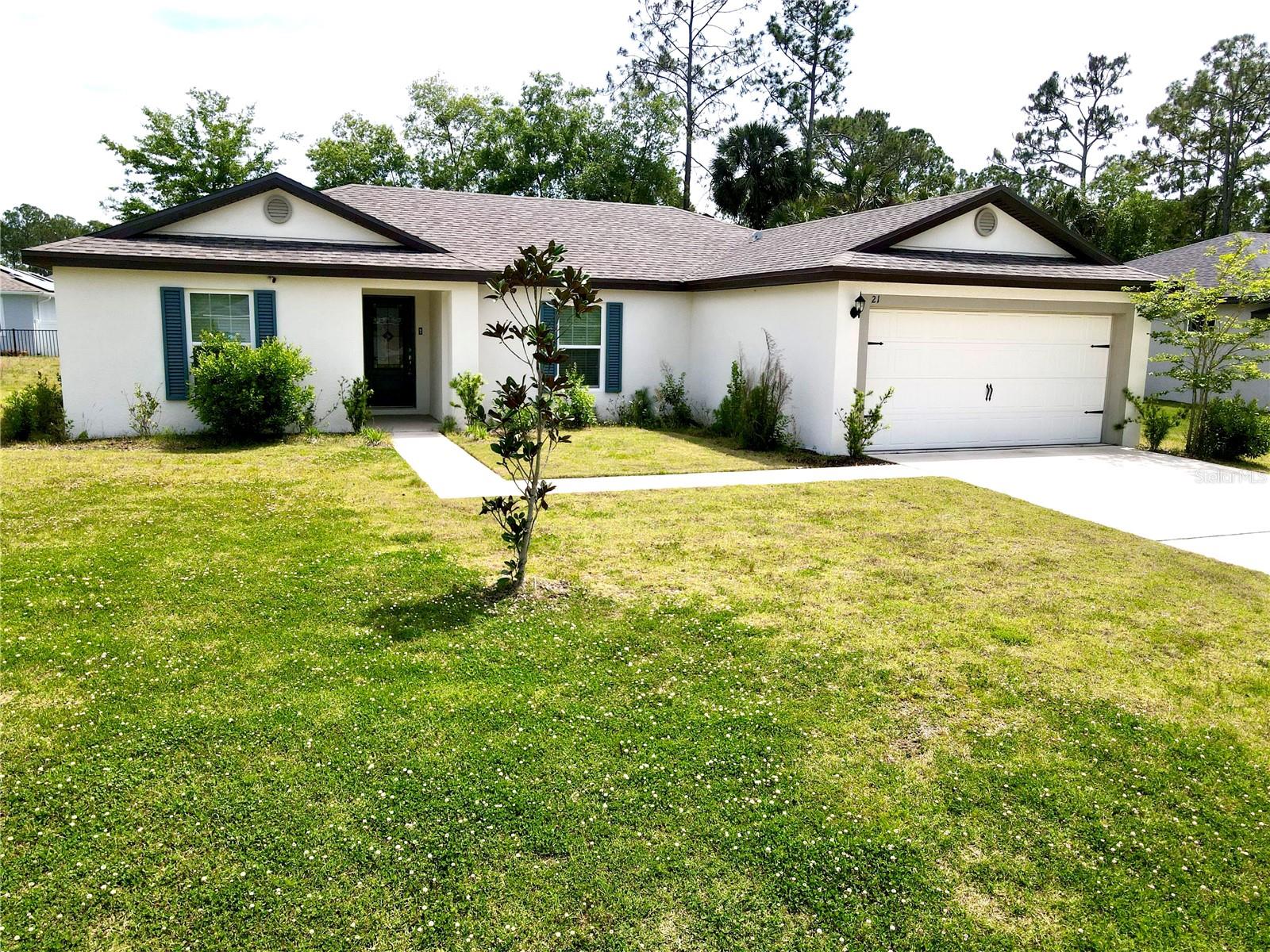 21 Slipper Flower Path E, FL