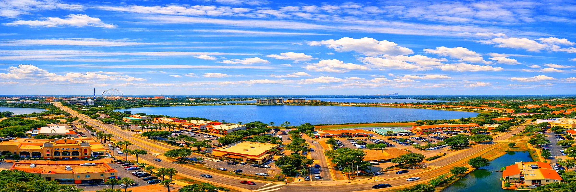 Aerial panorama of Sand Lake and the Dr. Phillips corridor, Orlando FL